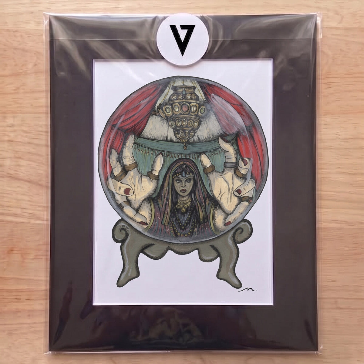 The matted Fortune Teller print sealed in a clear sleeve with the Veins of Ink sticker