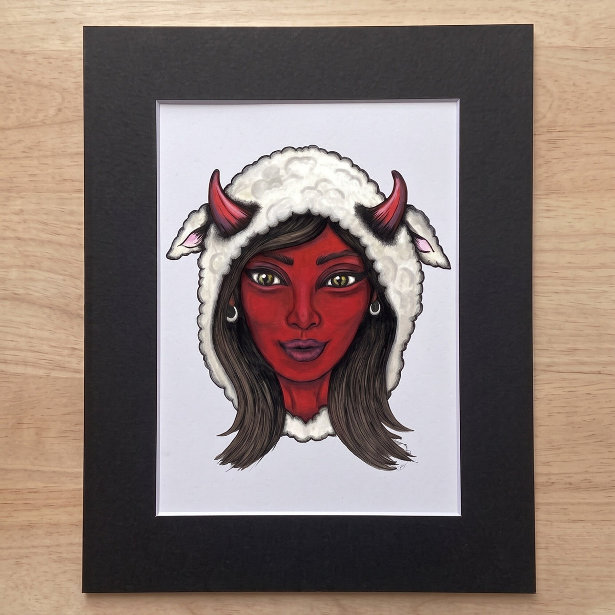 The Mama Shilli giclée print in its black mat, ready for a standard frame