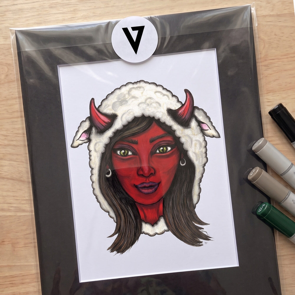 The matted Mama Shilli print sealed in a clear sleeve with the Veins of Ink sticker