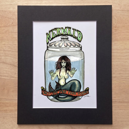The Fiji Mermaid giclée print in its black mat, ready for a standard frame